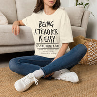 Load image into Gallery viewer, Teacher T-Shirt — "Being a Teacher Is Easy" Funny Quote Tee for Educators